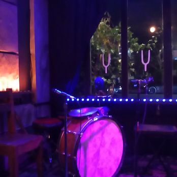 Tuning Fork - band's instruments before the arrival of the members in the band. Cute, small stage by the entrance. - Gastropubs Near Me - Studio City, California Tuning Fork - band's instruments before the arrival of the members in the band. Cute, small stage by the entrance. - Gastropubs Near Me - Studio City, California
