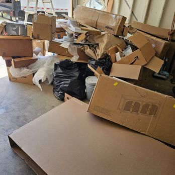 Hawaii Junk Removal - Is your garage looking like this after a big delivery or renovation project? No worries -- Hawaii Junk Removal is here to help!  Call now! - Junk Removal & Hauling Near Me - Honolulu, Hawaii