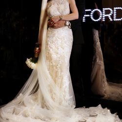 Le Marriage Couture - Dress, Veil & Tuxedo from Le Marriage Couture.