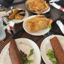 Beef Empanadas, Jalapeno poppers, and a beef and seafood Alcapurria Beef Empanadas, Jalapeno poppers, and a beef and seafood Alcapurria