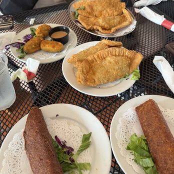 La Parrilla - Beef Empanadas, Jalapeno poppers, and a beef and seafood Alcapurria - Latin American Near Me - Luquillo, Puerto Rico La Parrilla - Beef Empanadas, Jalapeno poppers, and a beef and seafood Alcapurria - Latin American Near Me - Luquillo, Puerto Rico