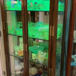 Greentown Antique Mall - Black light shows the uranium content of the old glass pieces.