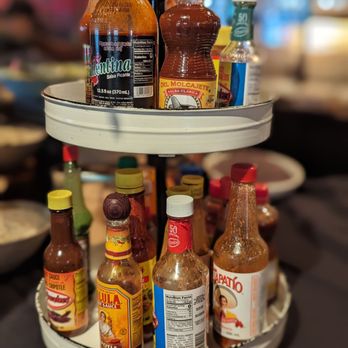 Cafe Tu Tu Tango - Variety of hot sauce options - Tapas/Small Plates Near Me - Orlando, Florida