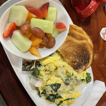 Another Broken Egg Cafe - Scrambled eggs with spinach and onions, sourdough toasts, and a side of fresh fruits - Breakfast & Brunch Near Me - Burbank, California Another Broken Egg Cafe - Scrambled eggs with spinach and onions, sourdough toasts, and a side of fresh fruits - Breakfast & Brunch Near Me - Burbank, California
