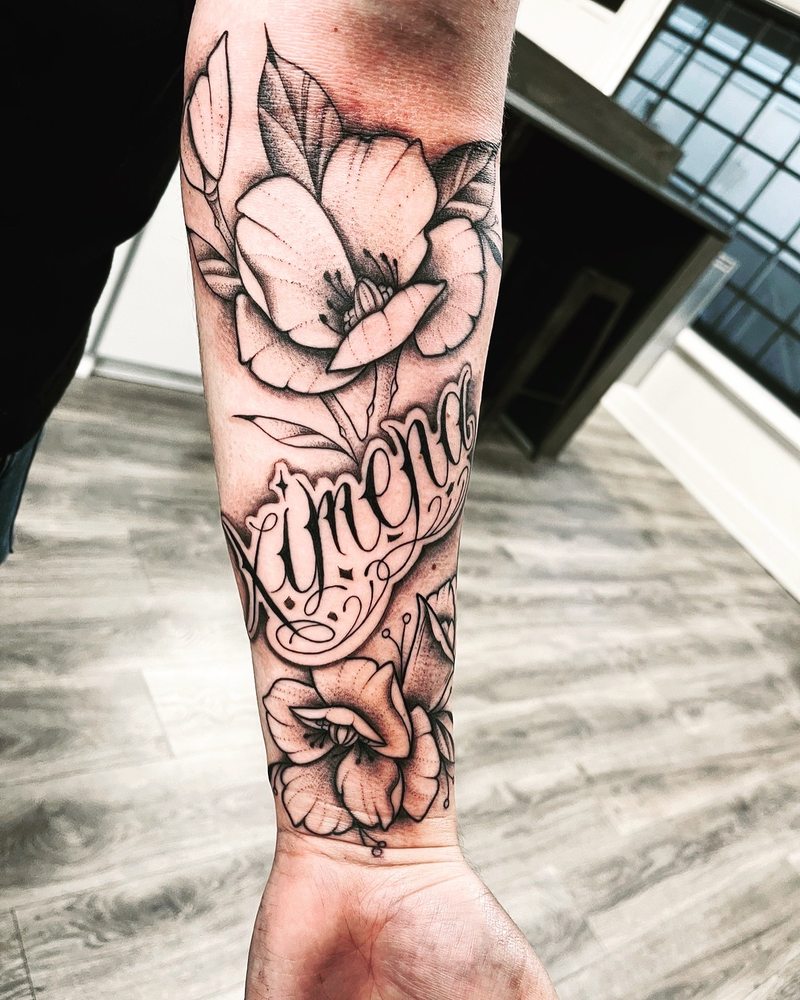 Made Grey Tattoo Logo
