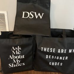DSW Designer Shoe Warehouse - The manager gave me these nice totes as opposed to me trying to carry all of the shoe boxes in plastic bags. Very nice touch