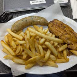 Blackened fish, boudin sausage and Cajun fries