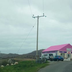 Lochboisdale Sub Post Office - Distinctive pink roofed post office. / Cafe