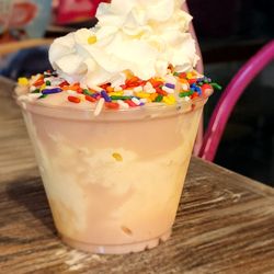 Chiki Churros - Sundae with Strawberry cream and sprinkles