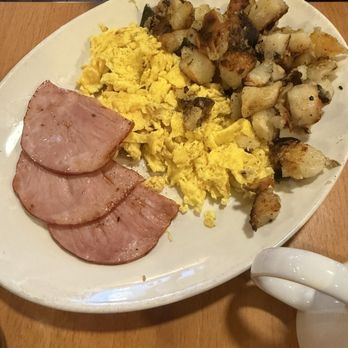 Sunset Grill - Apart of the Sunset Super ham, three eggs and potatoes.  1/2 waffle in other picture. - Breakfast & Brunch Near Me - Niagara-on-the-Lake, Ontario