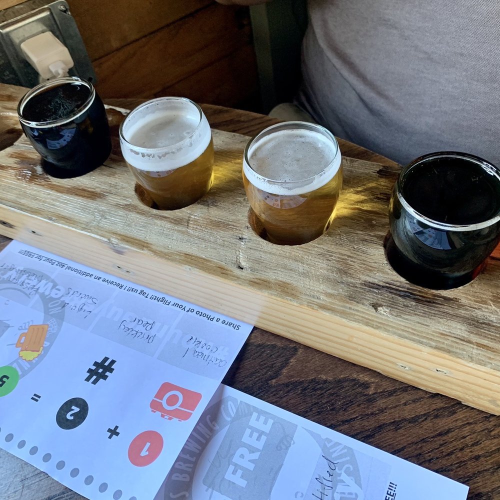 Beer flight: oatmeal cookie slacker, prickly pear desert cruiser, liquid swords double ipa, Russian messenger Beer flight: oatmeal cookie slacker, prickly pear desert cruiser, liquid swords double ipa, Russian messenger