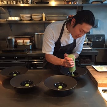 Commis - Meticulously prepping the scallop dish... - New American Near Me - Oakland, California Commis - Meticulously prepping the scallop dish... - New American Near Me - Oakland, California