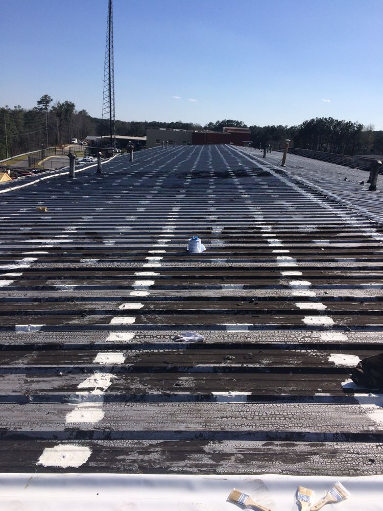 Slide of Advanced Roofing & Paving