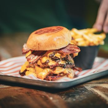 Sixes Social Cricket - a burger and french fries - Bars Near Me - The Colony, Texas Sixes Social Cricket - a burger and french fries - Bars Near Me - The Colony, Texas