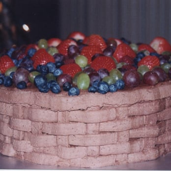 Have Your Cake - a chocolate cake with fruit on top - Bakeries Near Me Have Your Cake - a chocolate cake with fruit on top - Bakeries Near Me