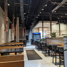 Sparkling clean restaurant with shiny copper hardware.