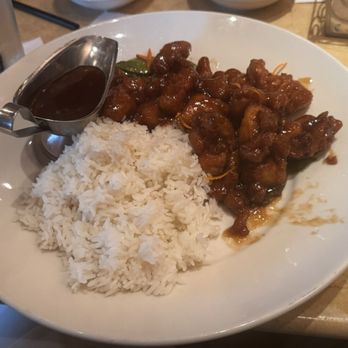 The Cheesecake Factory - Orange Chicken hiding the wilted vegetables - Desserts Near Me - Orlando, Florida