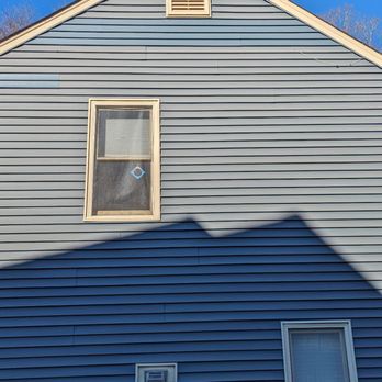 Carolina Custom Home Improvements - New siding replaced damaged siding. Correct color, fits flush, will fade to match over time. - Roofing Near Me