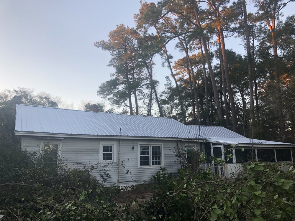 Slide of N&S Roofing