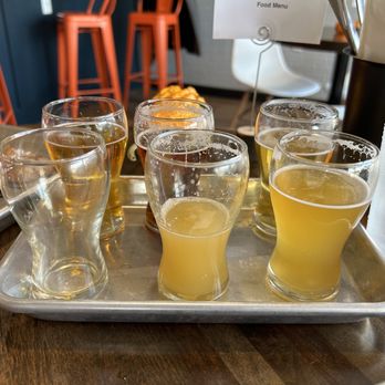 Midnight Owl Brewing - a tray of beer glasses on a table - Breweries Near Me - Shaker Heights, Ohio