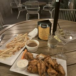 Peekskill Public Bar & Grill - Chicken Wings (Old Bay Dry Rub) &  Disco Fries