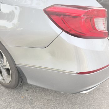 Metal Massager - The bumper dent, before - Mobile Dent Repair Near Me