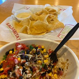 a bowl of rice and a bowl of chips a bowl of rice and a bowl of chips