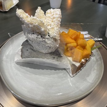 Petit Four Dessert Cafe - (L) black sesame cheesecake (R) mango tart - Desserts Near Me - Carrollton, Texas Petit Four Dessert Cafe - (L) black sesame cheesecake (R) mango tart - Desserts Near Me - Carrollton, Texas