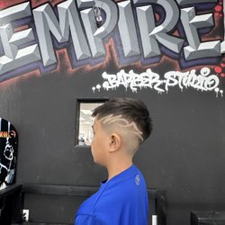 Empire Barber Studio - Middle son with a design haircut by Eddie.
