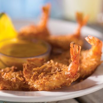 Bahama Breeze - Coconut Shrimp - Served with a citrus-mustard dipping sauce. - Bars Near Me - Lutz, Florida