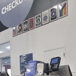 Best Buy - West Broad - Best Buy sporting the gay flag along side the Military flags. And they have promotion opportunities that white people can't apply for.