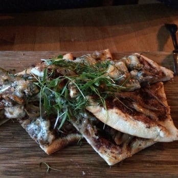 The Bison Restaurant - Flatbread with duck confit and Gorgonzola cheese. Great flavors. - Canadian (New) Near Me - Banff, Alberta The Bison Restaurant - Flatbread with duck confit and Gorgonzola cheese. Great flavors. - Canadian (New) Near Me - Banff, Alberta