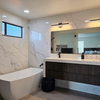 Core Kitchen Designs - Porcelain surround sleek and modern master bath with floating vanity cabinets. Rancho Bernardo, San Diego, CA - General Contractors Near Me - San Marcos, California Core Kitchen Designs - Porcelain surround sleek and modern master bath with floating vanity cabinets. Rancho Bernardo, San Diego, CA - General Contractors Near Me - San Marcos, California