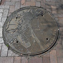 Canal Park - There are at least two Duluth manhole cover designs in the Canal Park area...