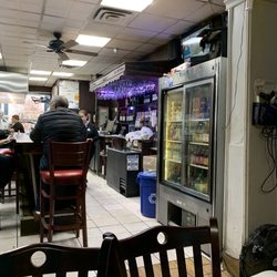Patrons enjoying chitchat and coffee
