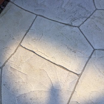 Capital Concrete Coatings - a shadow of a person on a patio - Masonry/Concrete Near Me - Austin, Texas