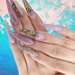CL Beautie Bar - Pink with cheetah prints on acrylic nails.