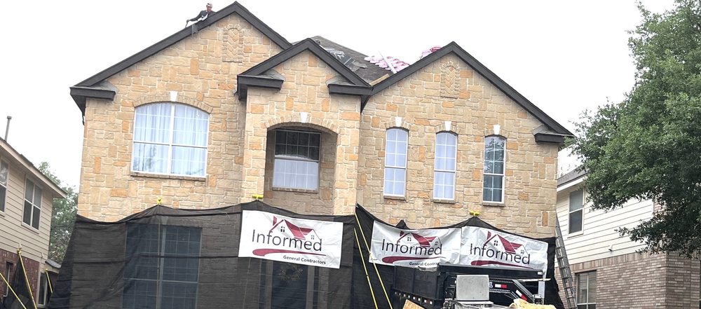 Slide of Informed Roofing & Restoration