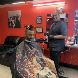 Mr J's Barber Shop - Big brother showing little brother haircuts are no big deal! Dantae has been coming to Mr J's for 16years, since he was 3years old.
