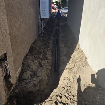 PVD Plumbing and Re-Pipe - 1950s Cast Iron drain line from 2nd floor going into a slab and into the crawl space. - Plumbing Near Me PVD Plumbing and Re-Pipe - 1950s Cast Iron drain line from 2nd floor going into a slab and into the crawl space. - Plumbing Near Me