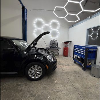 Woytek Auto - VW Beatle with hood propped - Auto Repair Near Me - Melbourne, Florida Woytek Auto - VW Beatle with hood propped - Auto Repair Near Me - Melbourne, Florida