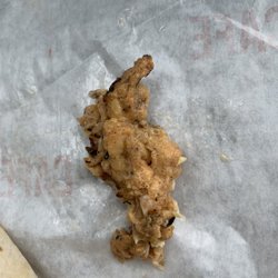 Chicken fat?  Gizzards?  Who knows.  Order something with chicken and you have the possibility to find out!