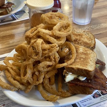 Scott's Diner - Homemade onion rings piled so high! Paired with a BELT on wheat toast. - Breakfast & Brunch Near Me - New Concord, Ohio Scott's Diner - Homemade onion rings piled so high! Paired with a BELT on wheat toast. - Breakfast & Brunch Near Me - New Concord, Ohio