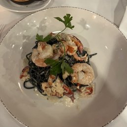 Squid ink spaghetti with prawns and lobster Squid ink spaghetti with prawns and lobster