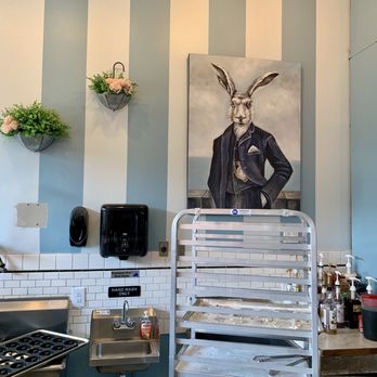 New Hampshire Doughnut Co. - Inside the shop with a distinguished gentleman overlooking the goings on! - Donuts Near Me - Concord, New Hampshire New Hampshire Doughnut Co. - Inside the shop with a distinguished gentleman overlooking the goings on! - Donuts Near Me - Concord, New Hampshire