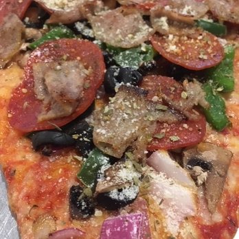 Ruby's by the Sea - thin doughy crust - Pizza Near Me - Pompano Beach, Florida