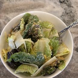 Caesar salad with smashed crouton bits spread throughout the lettuce. It was just being weird instead of unique.