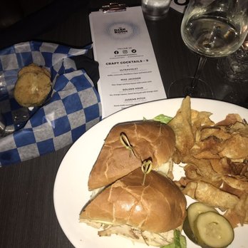 The Dark Room - The last of my fries pickles lol and The Turkey Club. - Wine Bars Near Me - Saint Louis, Missouri