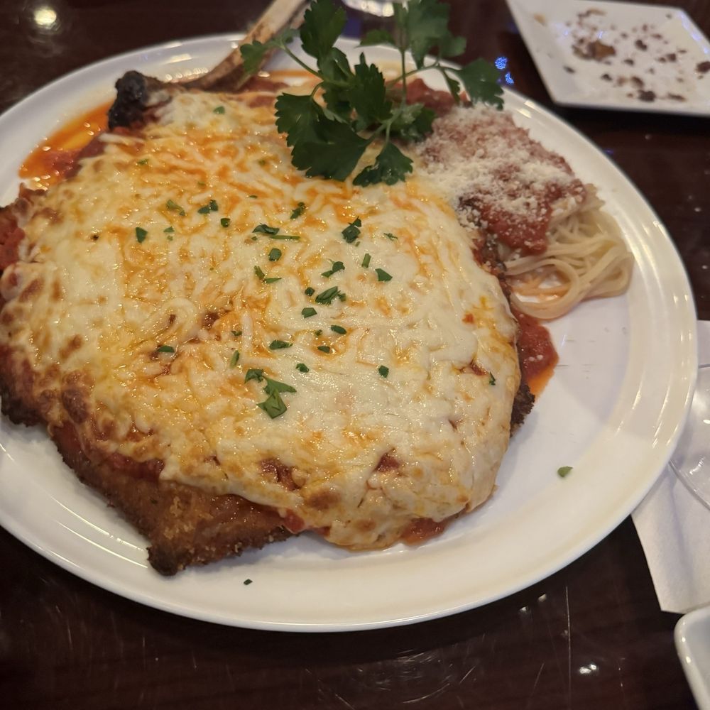 Parmesan Pete's Italian Kitchen - Veal chop Parmesan - Italian Near Me - Naples, Florida Parmesan Pete's Italian Kitchen - Veal chop Parmesan - Italian Near Me - Naples, Florida