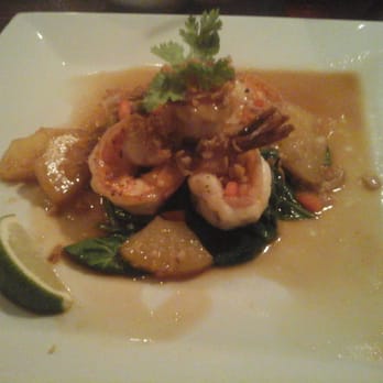 Thai Essence - Crystal Shrimp Pineapple topped with garlic, shallots & pineapple over sautéed spinach - Thai Near Me - Nutley, New Jersey Thai Essence - Crystal Shrimp Pineapple topped with garlic, shallots & pineapple over sautéed spinach - Thai Near Me - Nutley, New Jersey